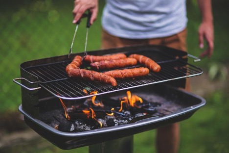 cooking outdoors with sausages