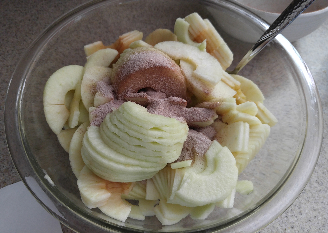 Add sugar mixture to apples.