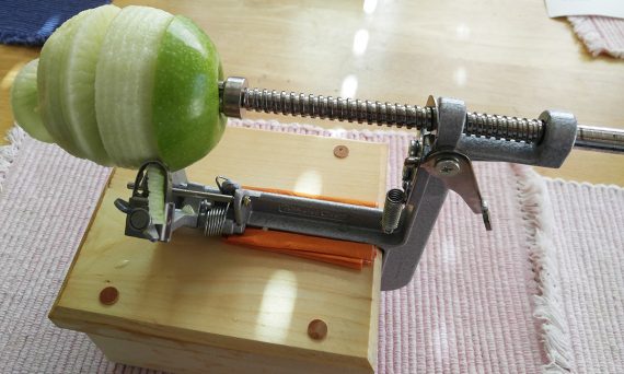 close up of Pampered Chef apple peeler and corer